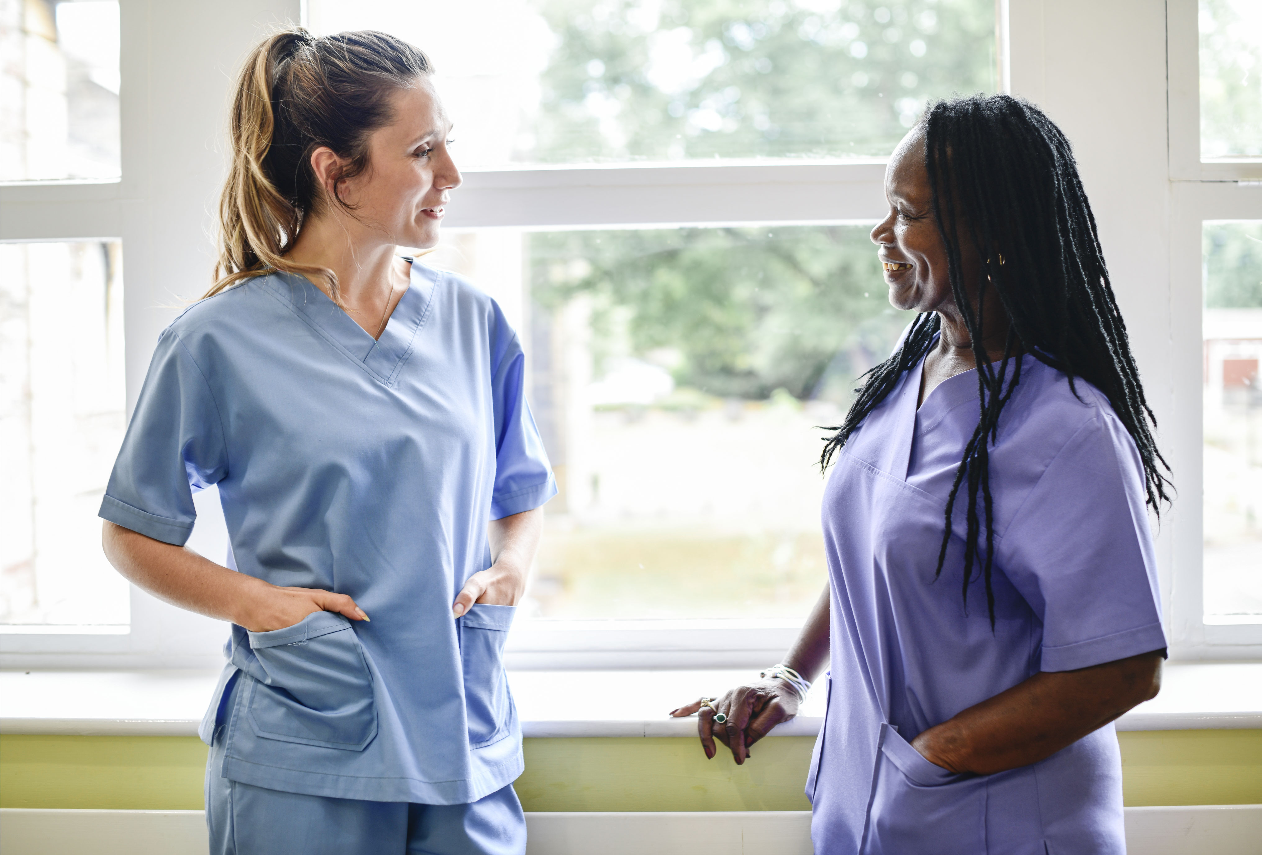 Photograph of two nurses who are friends