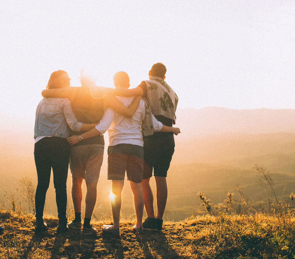 friends looking at sunset