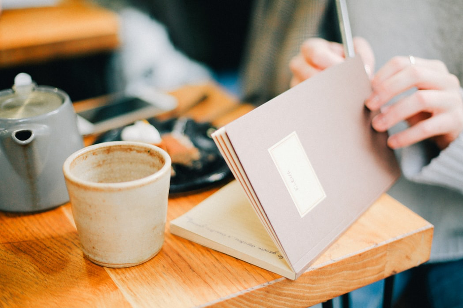 woman writing in a journal